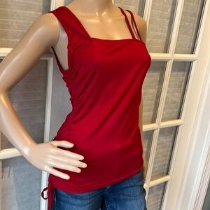 Shine sleeveless, red stretch silky top with ruched tie sides